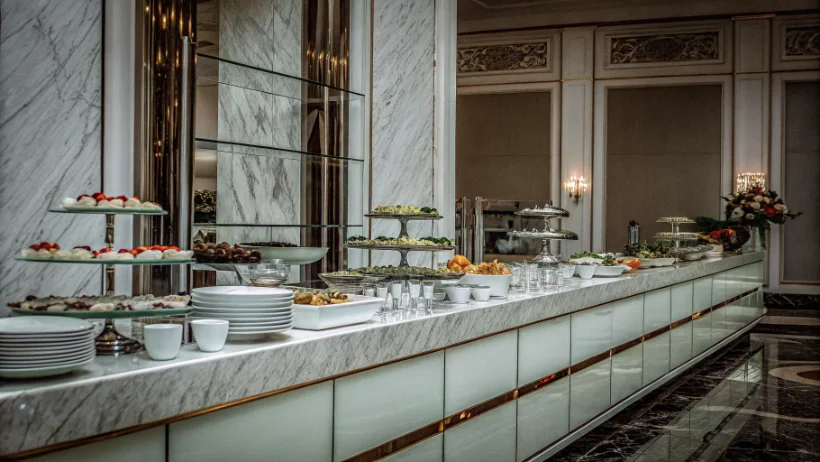 Elegant buffet station with gourmet dishes at casino event venue
